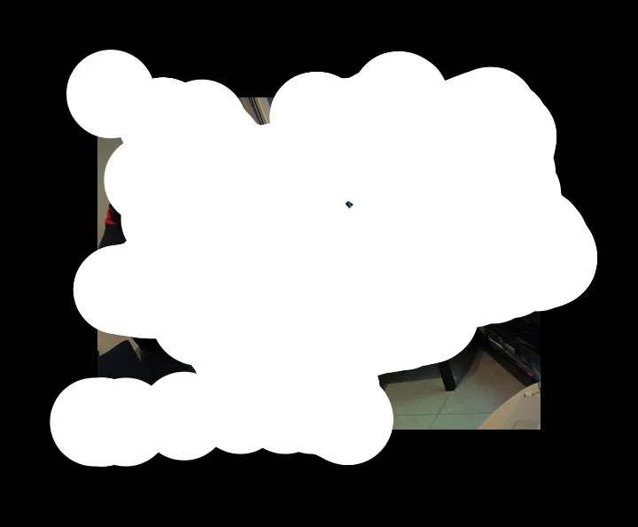 Delocalized Narratives #56. On the left hand side, there are two persons in black color shirt and t-shirt respectively, standing and watching television, that is in front of them. In the background, there is glass window, curtain, some materials on the table, monitors and some items on the table